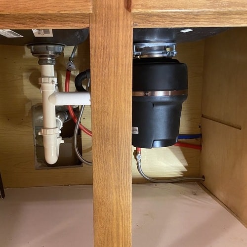 A Garbage Disposal Under a Sink